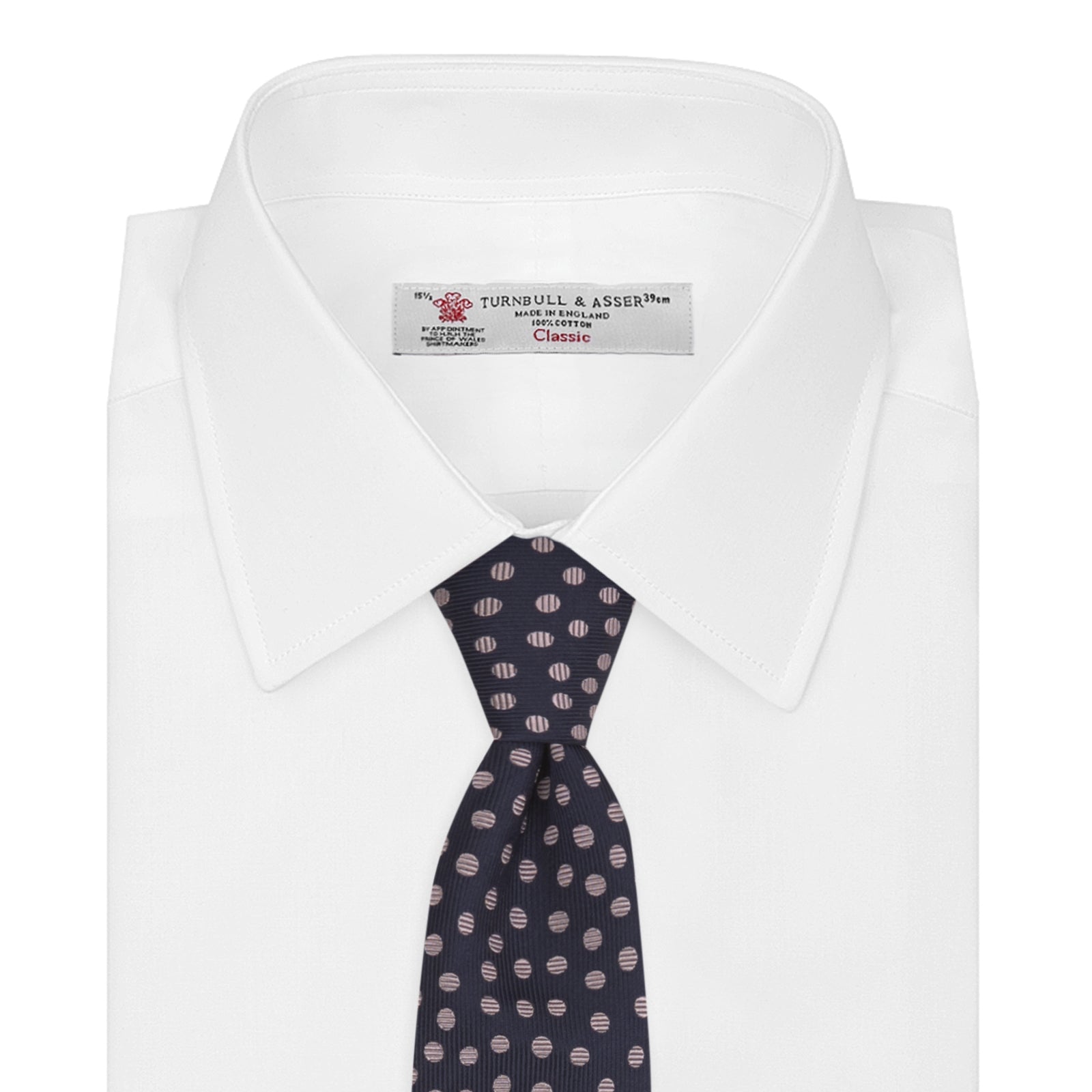 View 2 of product The Turnbull & Asser Navy and Pink Paint Spot Silk Tie, rolled at one end and set against a white background, adds a stylish touch to any office shirt with its modern spot pattern.