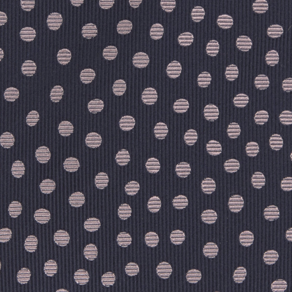 The Turnbull & Asser Navy and Pink Paint Spot Silk Tie, rolled at one end and set against a white background, adds a stylish touch to any office shirt with its modern spot pattern.
