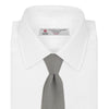 View 2 of product The Turnbull & Asser Light Grey Grenadine Silk Tie features a finely textured checkered pattern and superb dimensional stability, shown rolled up against a plain white background.