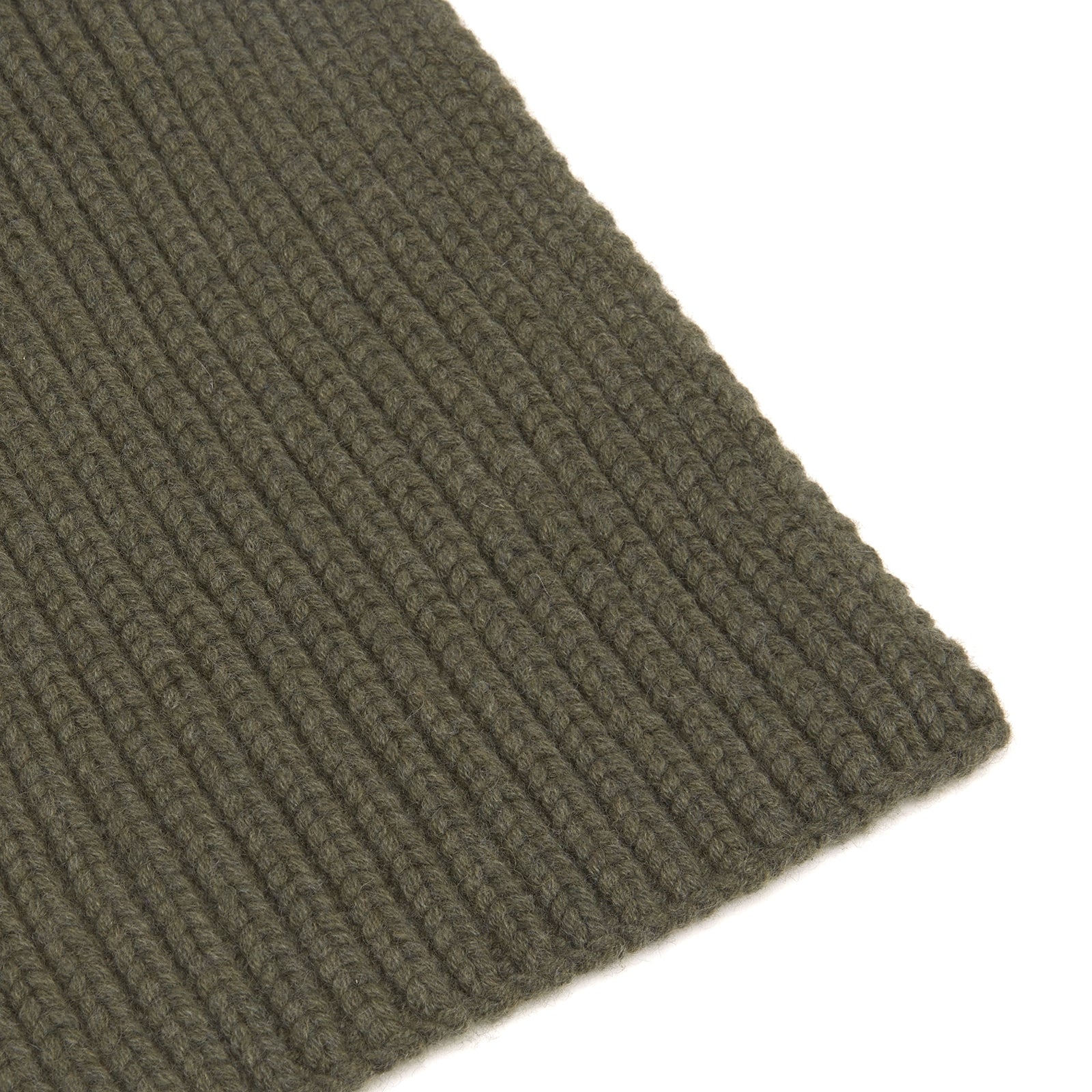 View 2 of product The Turnbull & Asser Khaki Green Knitted Cashmere Scarf is laid flat with one end looped through the other, showcasing its thick, cozy texture—an ideal winter accessory.
