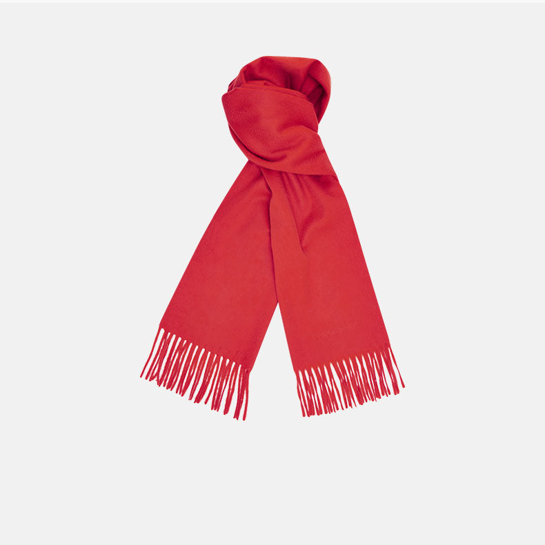 The Turnbull & Asser Red Pure Cashmere Scarf features hand-woven cashmere with fringed ends, elegantly folded against a plain white background for a classic Scottish look.