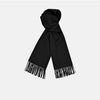 View 1 of product A Turnbull & Asser Black Pure Cashmere Scarf with fringe on both ends, neatly folded and displayed on a plain white background.
