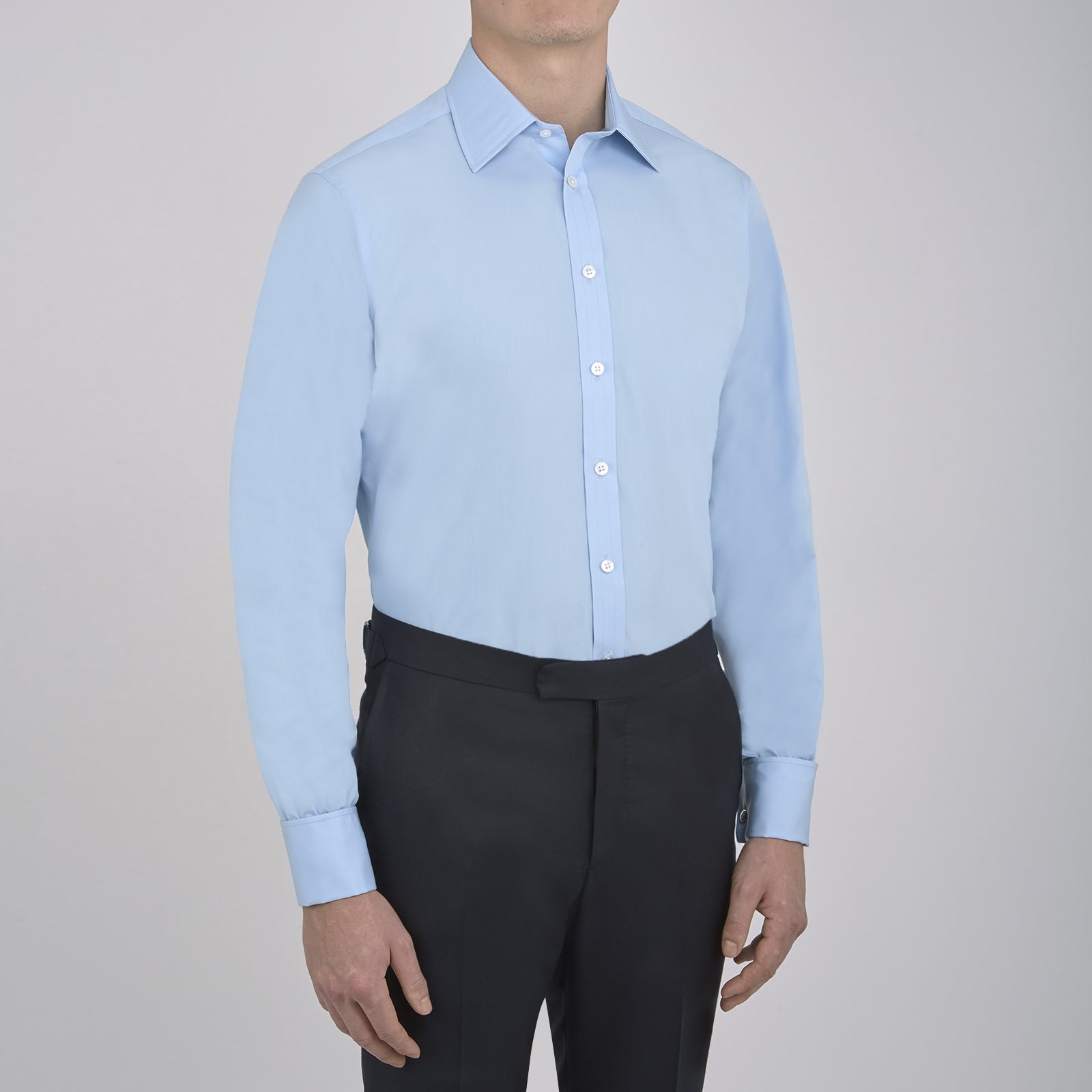 View 2 of product A Light Blue Cotton Shirt with T&A Collar and Double Cuffs by Turnbull & Asser, neatly folded and displayed on a plain white background.
