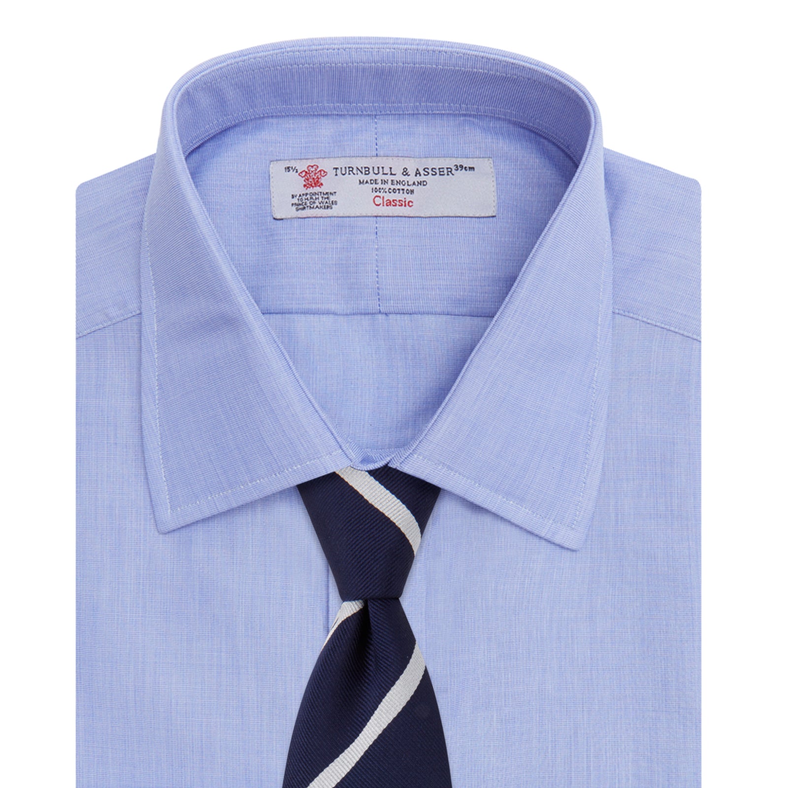 View 4 of product The Turnbull & Asser Blue End-on-End Cotton Shirt features a T&A collar, double cuffs, white buttons, and a chest pocket. Displayed neatly folded on a white background with the label visible at the neck—ideal for refined style.