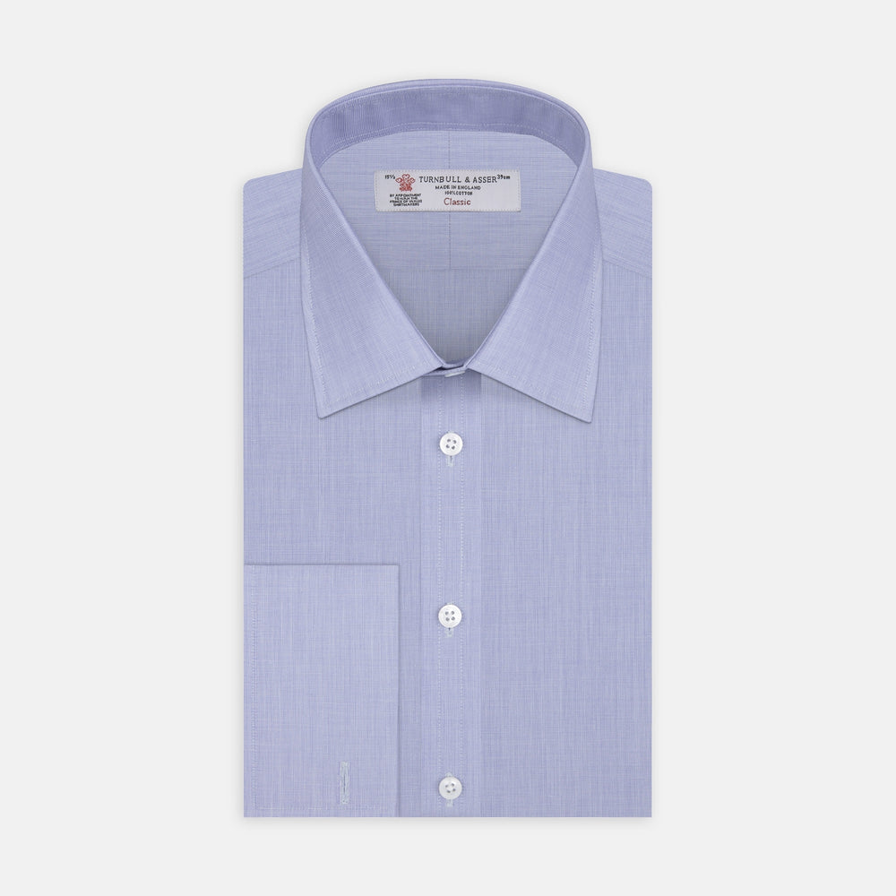 The Turnbull & Asser Blue End-on-End Cotton Shirt features a T&A collar, double cuffs, white buttons, and a chest pocket. Displayed neatly folded on a white background with the label visible at the neck—ideal for refined style.