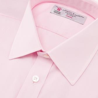 The Turnbull & Asser Pink End-on-End Shirt features a T&A collar, 3-button cuffs, and white buttons—a refined choice for any smart look—shown neatly folded against a plain white background.
