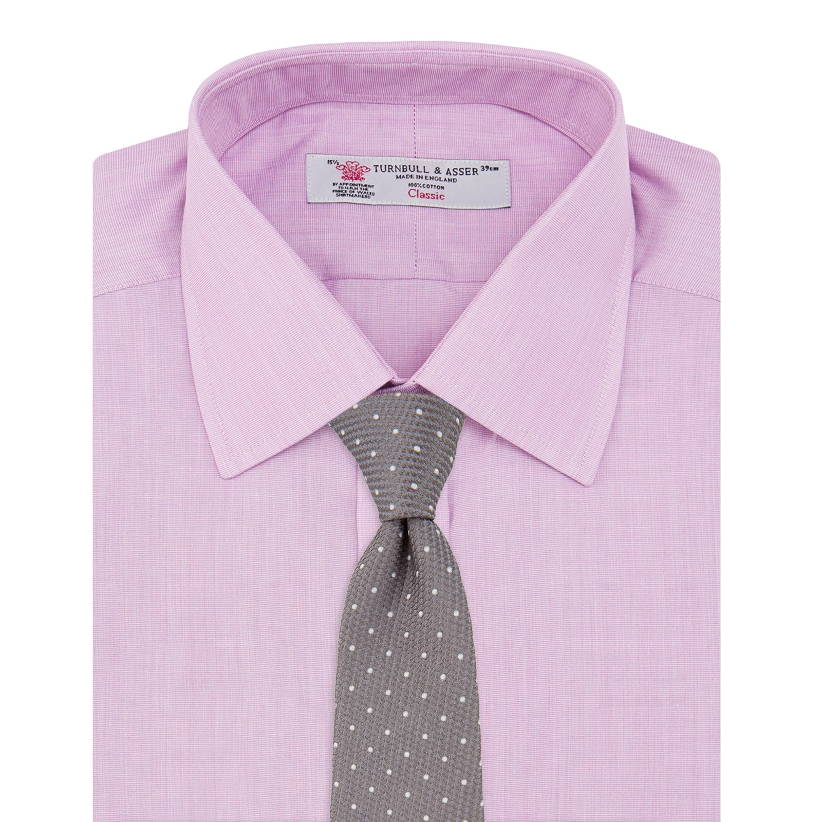 View 4 of product A neatly folded Turnbull & Asser Lilac End-on-End Shirt with T&A collar and 3-button cuffs, featuring white buttons and long sleeves, is displayed on a plain white background.