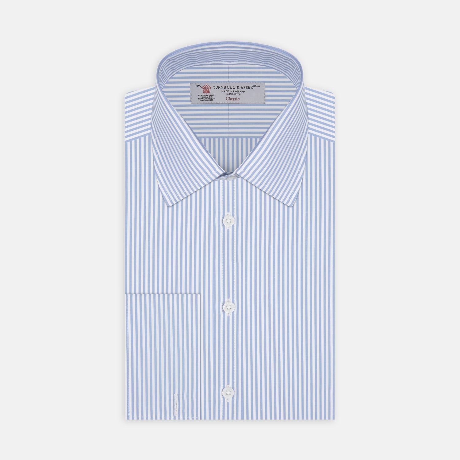 View 1 of product The Turnbull & Asser Light Blue Bengal Stripe Shirt features a T&A collar, double cuffs, and white buttons, offering British flair in blue and white stripes against a plain background.