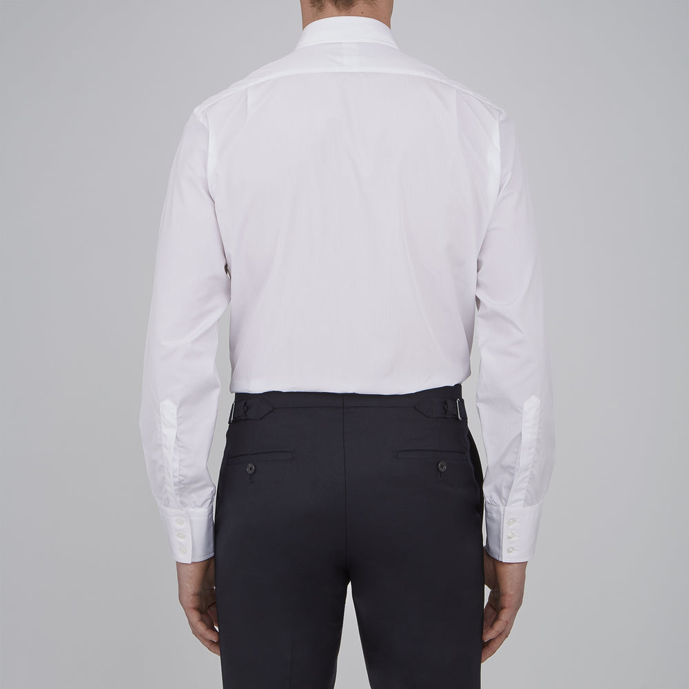 The Turnbull & Asser Two-Fold 120 White Shirt features a T&A collar and 3-button cuffs—an everyday essential, displayed against a light blue background.