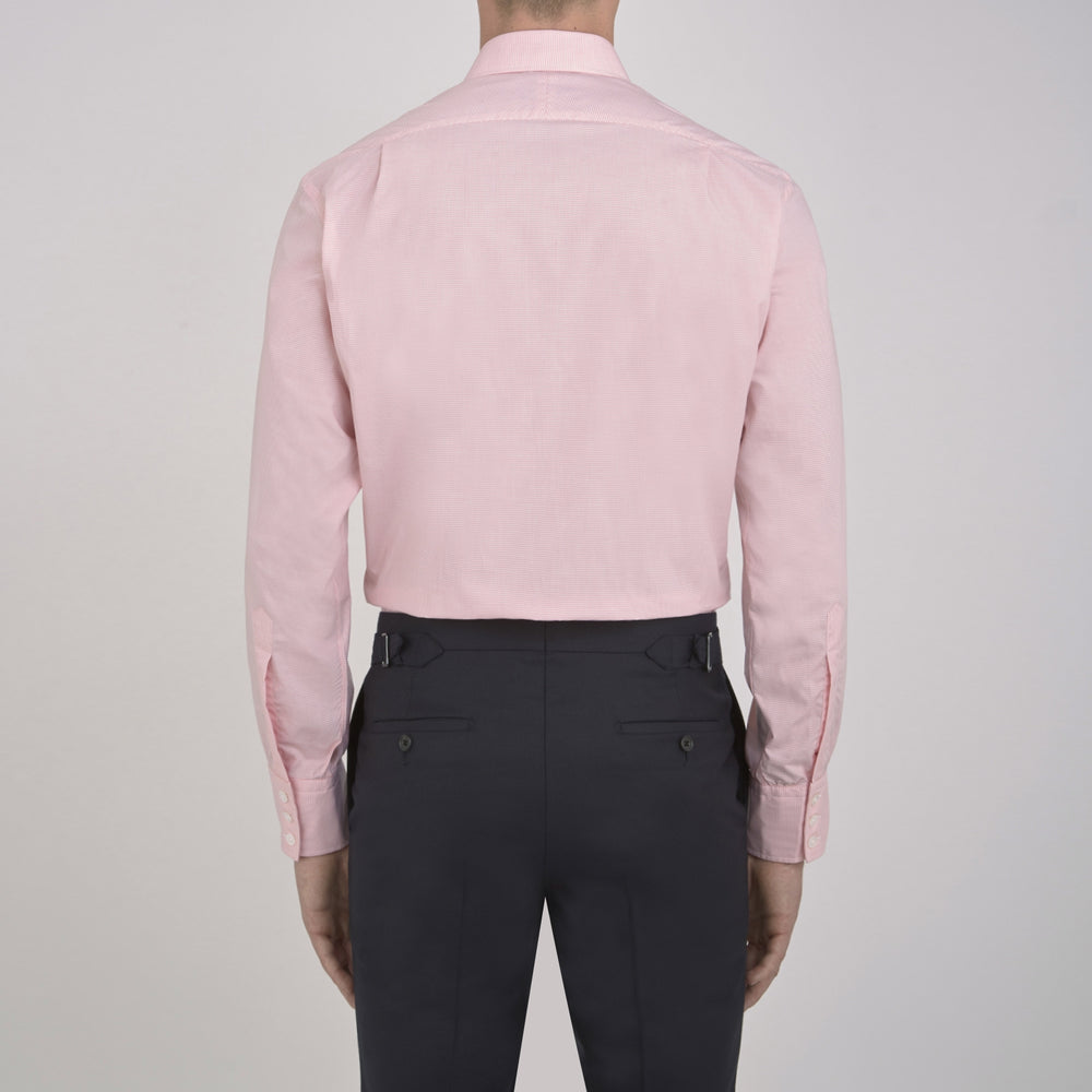 The Turnbull & Asser Pink Micro-Check Cotton Shirt features a T&A collar, 3-button cuffs, and a refined micro-check pattern, shown neatly folded against a white background.
