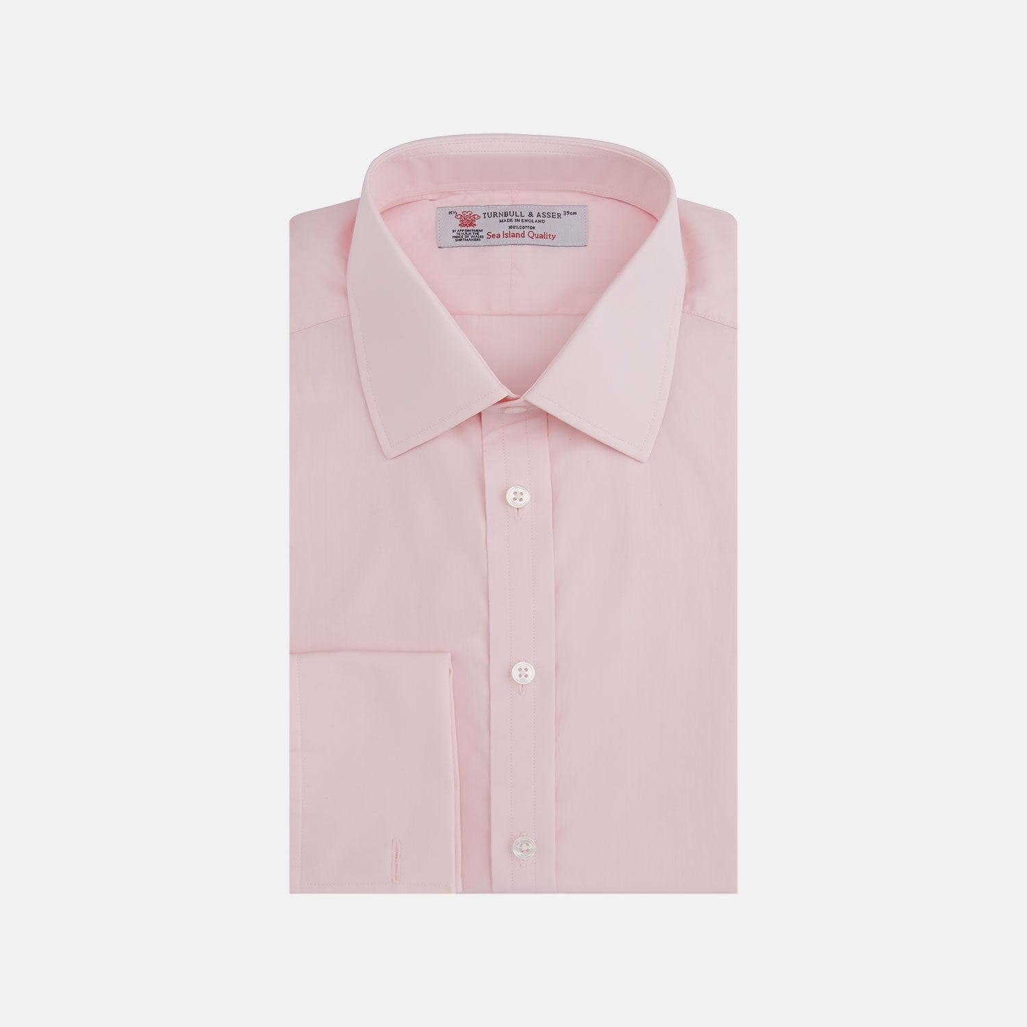 View 1 of product A slim black herringbone silk tie by Turnbull & Asser is paired with a neatly folded light pink long-sleeve dress shirt with a classic collar and white buttons, all displayed on a plain white background.