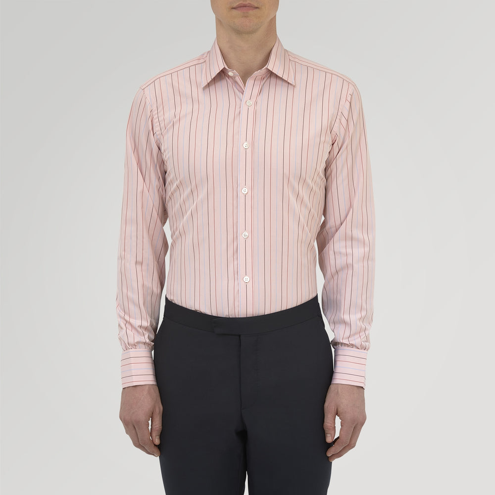 Turnbull & Asser’s Pink, Red and Blue Pencil Stripe Shirt features a T&A collar, double cuffs, and multicolored vertical stripes on a light pink base—perfect for adding spring style to your wardrobe.