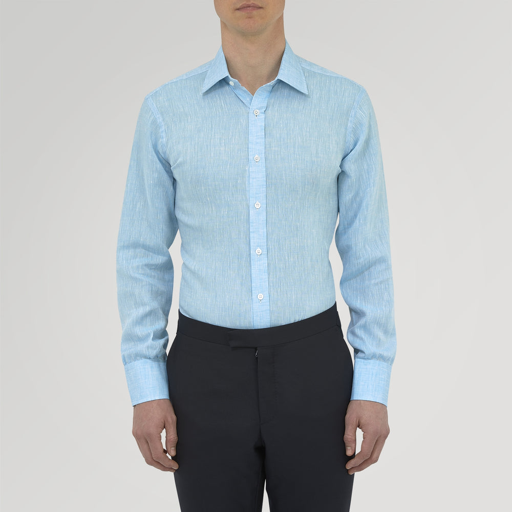 The Turquoise Linen Shirt by Turnbull & Asser features a T&A collar and 3-button cuffs, neatly displayed on a white background—an elegant summer essential for effortless style.
