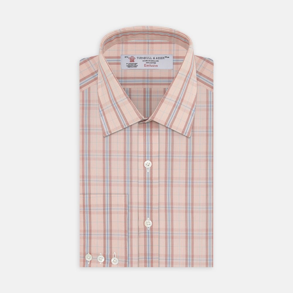 A neatly folded Turnbull & Asser Red, Grey and Navy Mixed Check Shirt features a T&A collar, white buttons, and 3-button cuffs. The label inside the collar is visible—a standout for any seasonal look.