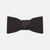 View 1 of product The Turnbull & Asser Black Silk Bow Tie features a matte finish and classic design, ideal for formal occasions. Shown pre-tied against a plain white background.