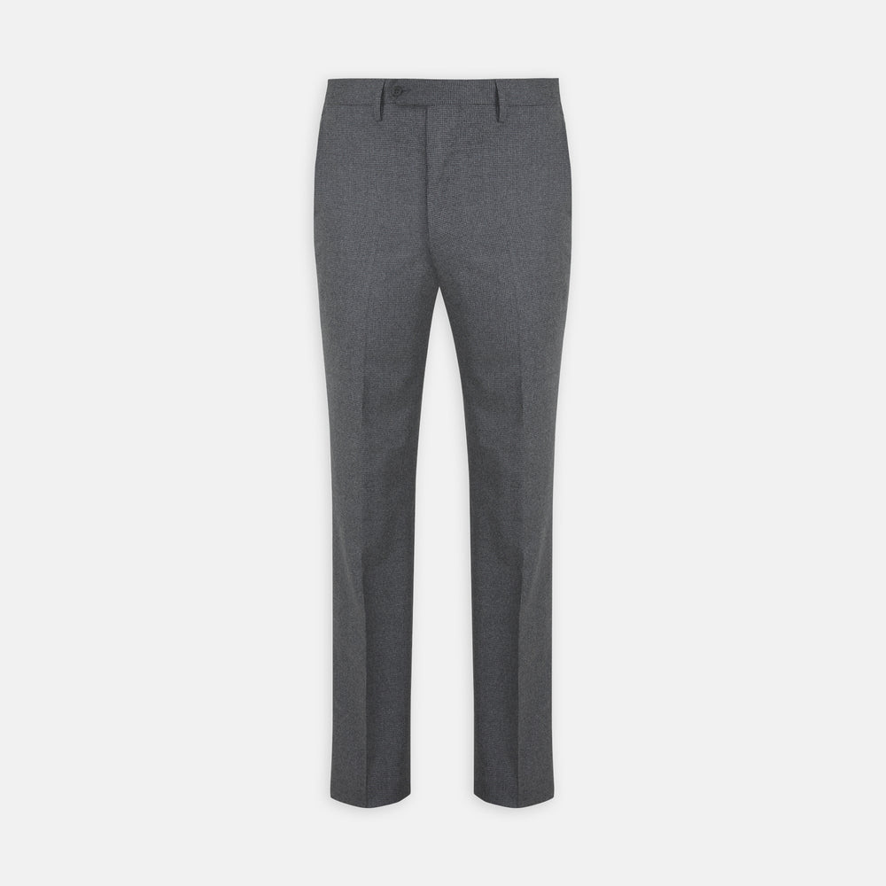 The Turnbull & Asser Jackson Grey Flannel Wool Trousers feature a tailored fit with button and zipper closure, crafted from premium wool flannel for a refined look, shown against a plain white background.
