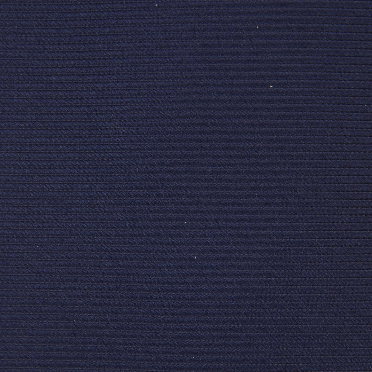 View 4 of product The Slim Navy Twill Silk Tie by Turnbull & Asser features a classic textured design—perfect with a cotton shirt—neatly displayed on a white background.