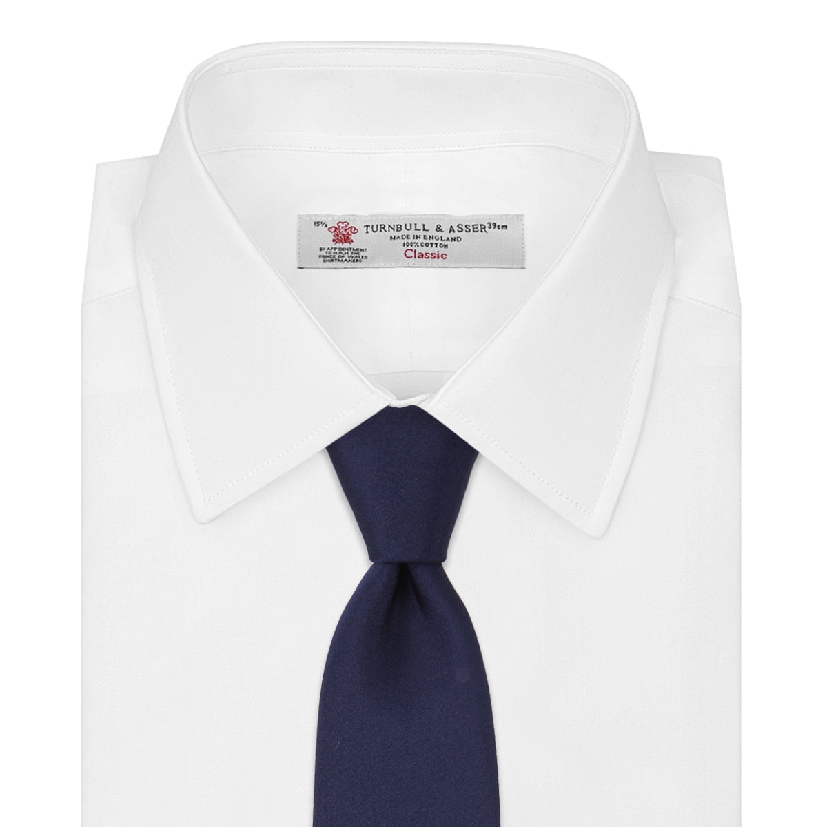 View 2 of product The Turnbull & Asser Long Navy Plain Satin Silk Tie is neatly rolled and displayed against a plain white background.