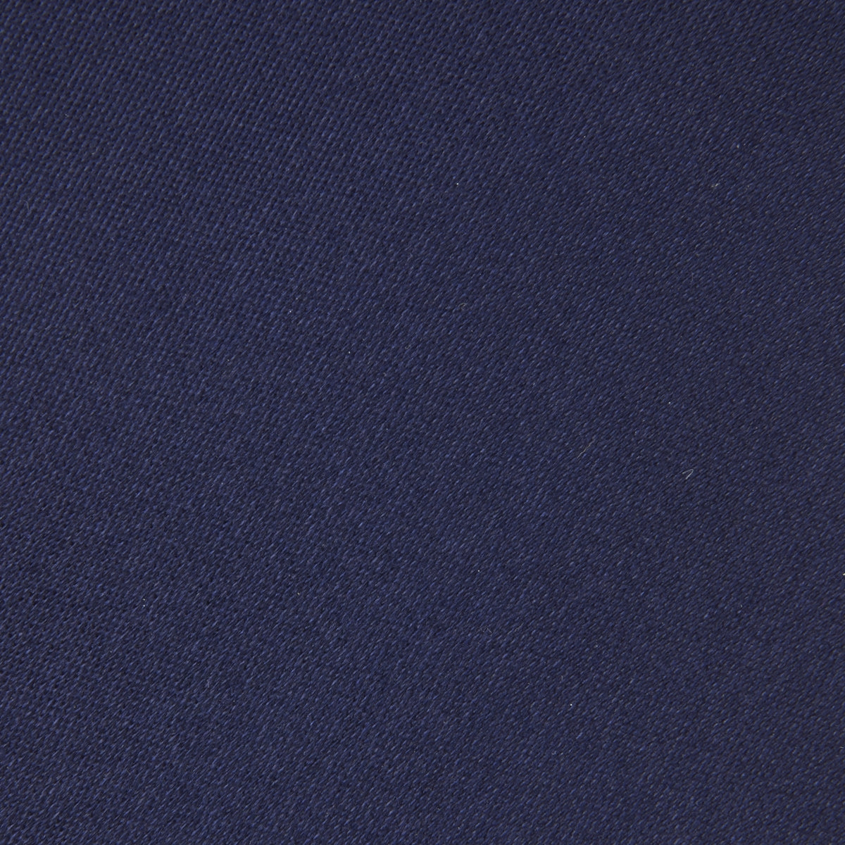 View 3 of product The Turnbull & Asser Long Navy Plain Satin Silk Tie is neatly rolled and displayed against a plain white background.