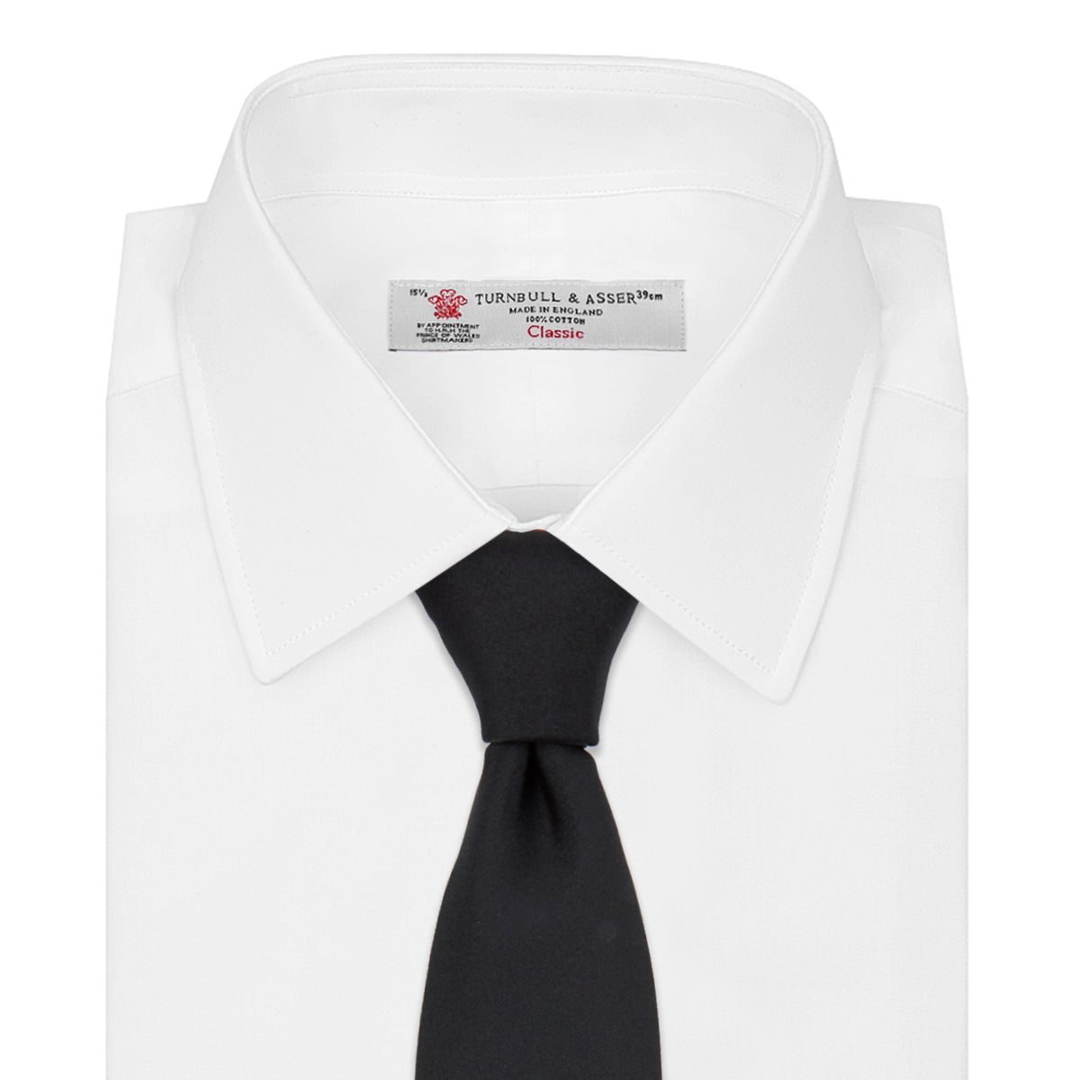 View 2 of product The Turnbull & Asser Black Plain Satin Silk Tie, neatly rolled and shown on a white background, adds versatile elegance to any formal outfit.