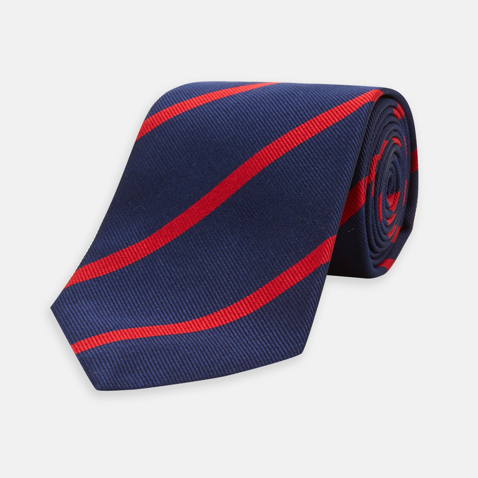 View 1 of product The Navy and Red Blazer Stripe Repp Silk Tie by Turnbull & Asser is a classic accessory, ideal for a timeless schoolboy look or to complement any sharp office shirt.