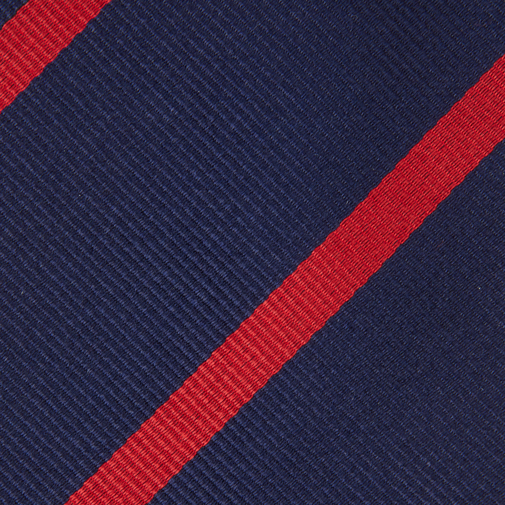 The Navy and Red Blazer Stripe Repp Silk Tie by Turnbull & Asser is a classic accessory, ideal for a timeless schoolboy look or to complement any sharp office shirt.