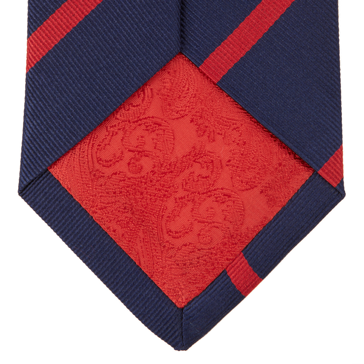 View 4 of product The Navy and Red Blazer Stripe Repp Silk Tie by Turnbull & Asser is a classic accessory, ideal for a timeless schoolboy look or to complement any sharp office shirt.