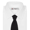View 2 of product The Turnbull & Asser Black Knitted Silk Tie features a textured pattern and is displayed rolled up on a white background—a stylish, versatile accessory perfect for elevating any gentleman's wardrobe.