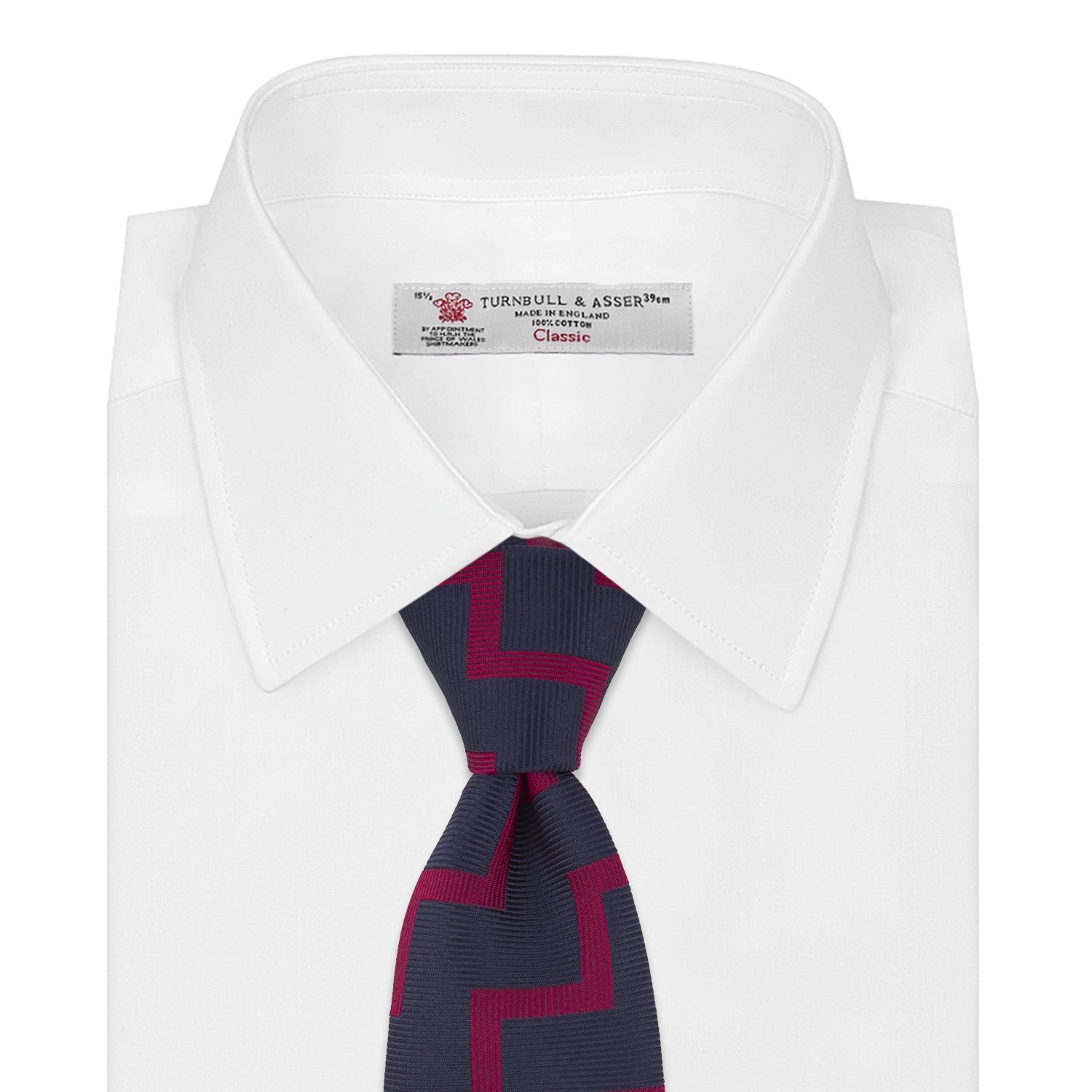 View 2 of product The Turnbull & Asser Navy and Red Striped Zigzag Silk Tie, featuring a striking pattern, is elegantly rolled on a white background—ideal for the modern gentleman.