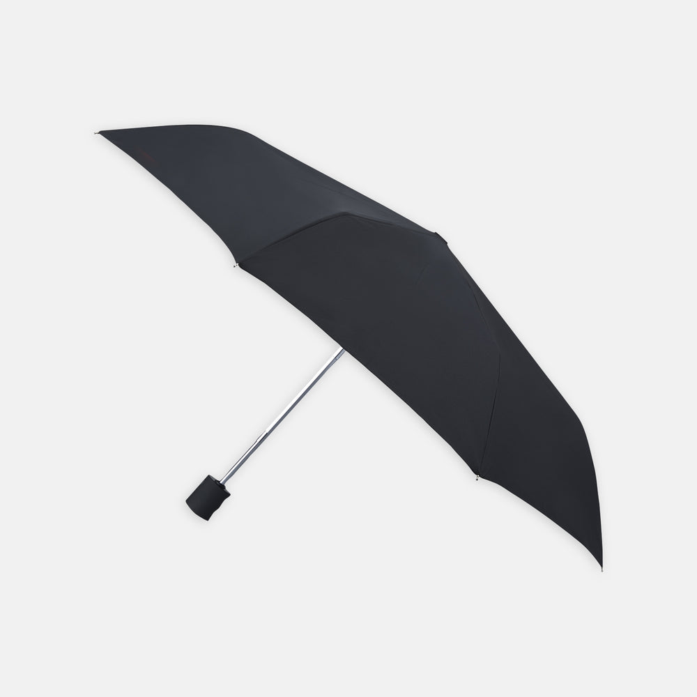 The Turnbull & Asser Black Automatic Telescopic Umbrella features a matte black handle and a sturdy, sleek design.