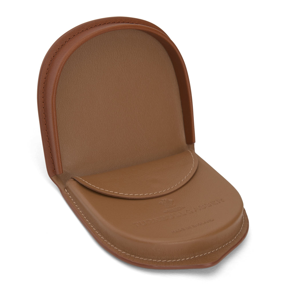A classic light tan leather Tray Purse by Turnbull & Asser, featuring visible edge stitching and shown upright against a white background.