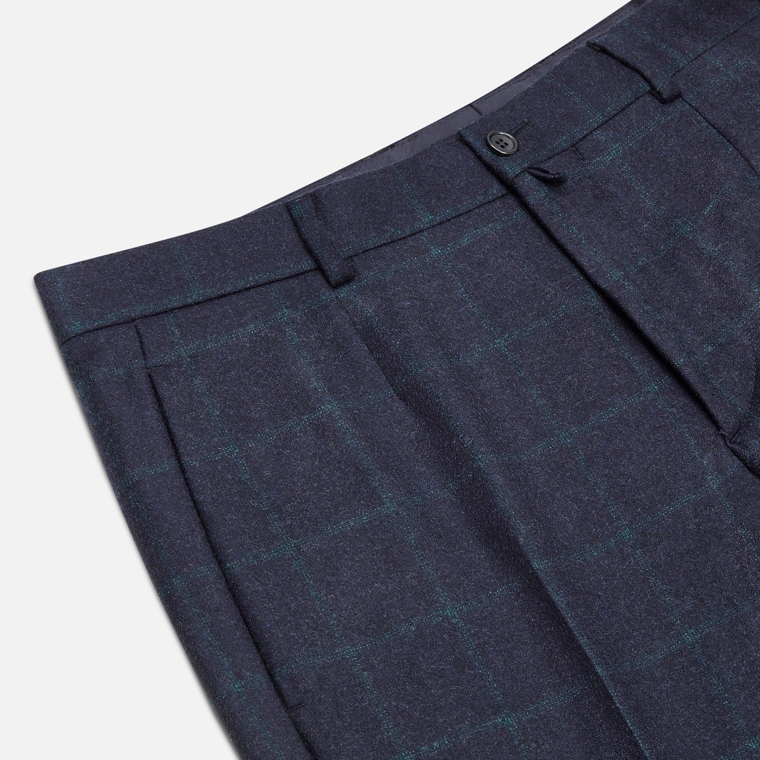 View 2 of product Turnbull & Asser’s Midnight and Green Check Rupert Trousers feature front pleats, belt loops, a button closure, and are finely crafted from wool and cashmere, shown against a plain white background.