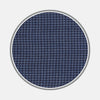 View 1 of product A circular swatch of Turnbull & Asser's Navy Check Flannel Fabric features a small repeating houndstooth pattern in navy blue, set on a white background with a thin gray border.