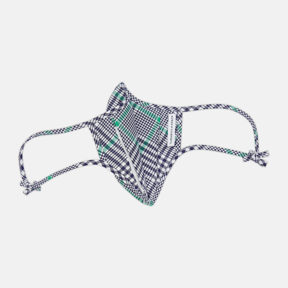 The Turnbull & Asser Exclusive Navy & Green Archive Check Superfine Cotton Commuter Mask features adjustable ear loops with bows and comes with 3 Viroformula™ filters.