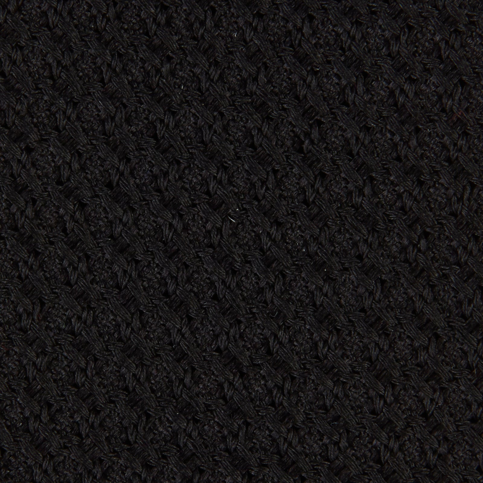 View 3 of product The Turnbull & Asser Seven-Fold Black Grenadine Silk Tie, displayed on a white background, adds a refined touch of luxury neckwear.