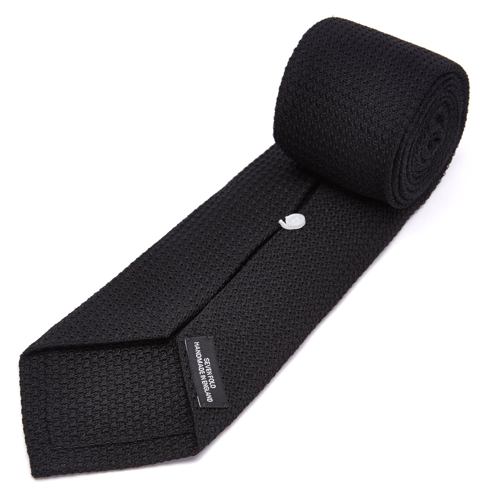 View 4 of product The Turnbull & Asser Seven-Fold Black Grenadine Silk Tie, displayed on a white background, adds a refined touch of luxury neckwear.