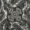 View 2 of product The White Persian Paisley Pocket Square by Turnbull & Asser features a refined black paisley and floral pattern with a decorative border, making it a sophisticated, festive gift.