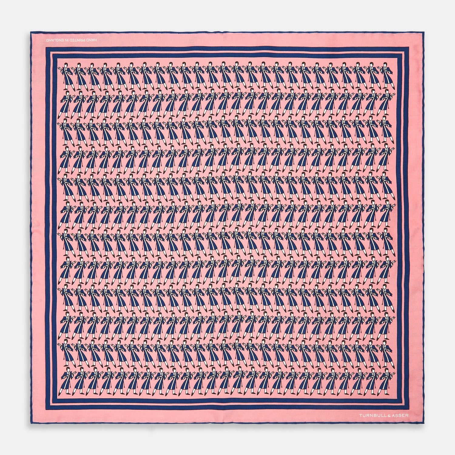 View 1 of product The Pink Dressing Gowns Pocket Square by Turnbull & Asser features a pink base inspired by classic dressing gowns, with black and white illustrated golfers in swinging poses and navy and pink striped borders.