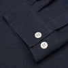 View 3 of product The Turnbull & Asser Holiday Fit Navy Cotton and Cashmere Blend Shirt features 1-button cuffs, a notched collar, and a single chest pocket, shown against a plain white background.