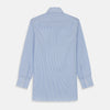 View 5 of product The Turnbull & Asser Light Blue Bengal Stripe Shirt features white vertical stripes, a classic T&A collar, and 3-button cuffs. Buttoned down the front, it’s laid flat on a white background for a timeless British look.