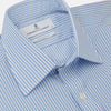 View 2 of product The Turnbull & Asser Light Blue Bengal Stripe Shirt features white vertical stripes, a classic T&A collar, and 3-button cuffs. Buttoned down the front, it’s laid flat on a white background for a timeless British look.