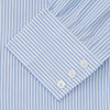View 3 of product The Turnbull & Asser Light Blue Bengal Stripe Shirt features white vertical stripes, a classic T&A collar, and 3-button cuffs. Buttoned down the front, it’s laid flat on a white background for a timeless British look.