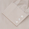View 3 of product The Turnbull & Asser Sand Bengal Stripe Regular Fit Shirt features thin sand stripes, a T&A collar, and 3-button cuffs. Shown laid flat on a white background.