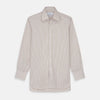 View 1 of product The Turnbull & Asser Sand Bengal Stripe Regular Fit Shirt features thin sand stripes, a T&A collar, and 3-button cuffs. Shown laid flat on a white background.