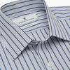 View 4 of product The Turnbull & Asser Navy Stripe Regular Fit Shirt features a T&A collar, square double cuffs, and thin vertical navy stripes on white.