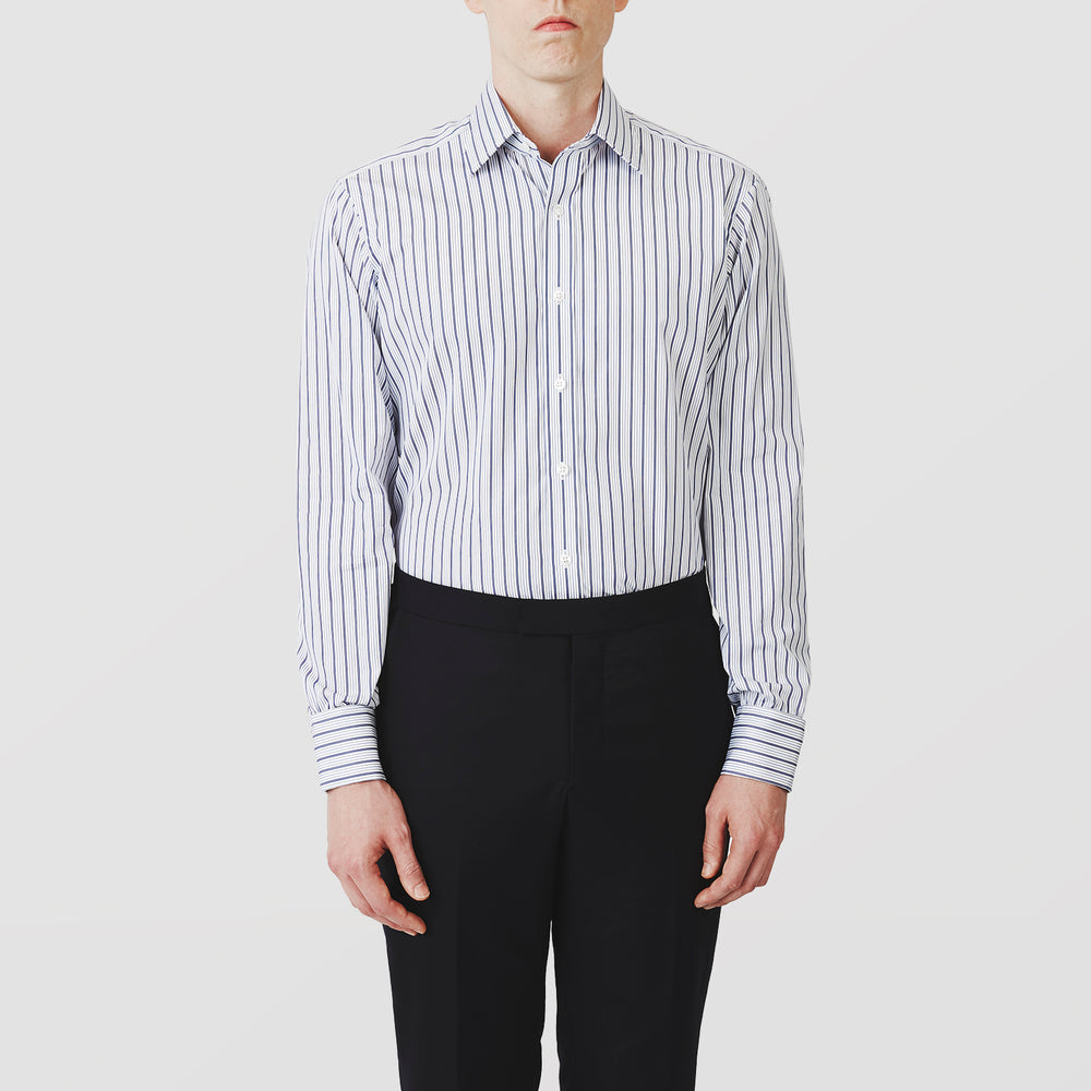 The Turnbull & Asser Navy Stripe Regular Fit Shirt features a T&A collar, square double cuffs, and thin vertical navy stripes on white.
