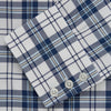 View 5 of product The Turnbull & Asser Blue Check Shirt features a T&A collar and 3-button cuffs, shown laid flat against a white background.