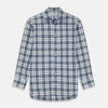 View 1 of product The Turnbull & Asser Blue Check Shirt features a T&A collar and 3-button cuffs, shown laid flat against a white background.