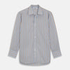 View 1 of product The Turnbull & Asser Blue and Brown Stripe Poplin Shirt features a T&A collar, three-button cuffs, and vertical blue, white, and tan stripes. This smart-casual shirt is displayed on a plain light background.