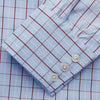 View 3 of product The Burgundy Graph Check Regular Fit Shirt by Turnbull & Asser features a T&A collar, 3-button cuffs, and a check pattern. Laid flat on a white background.